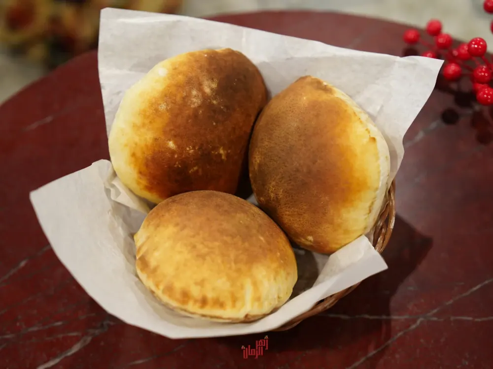 Fresh bread in a paper-lined basket